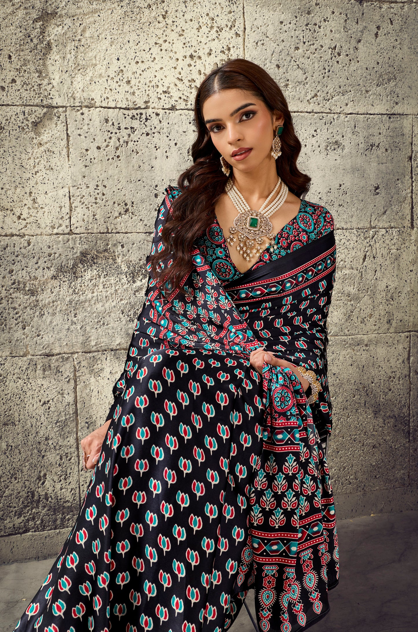 Dark printed ready-to-wear saree with sleeveless blouse, turquoise border drape