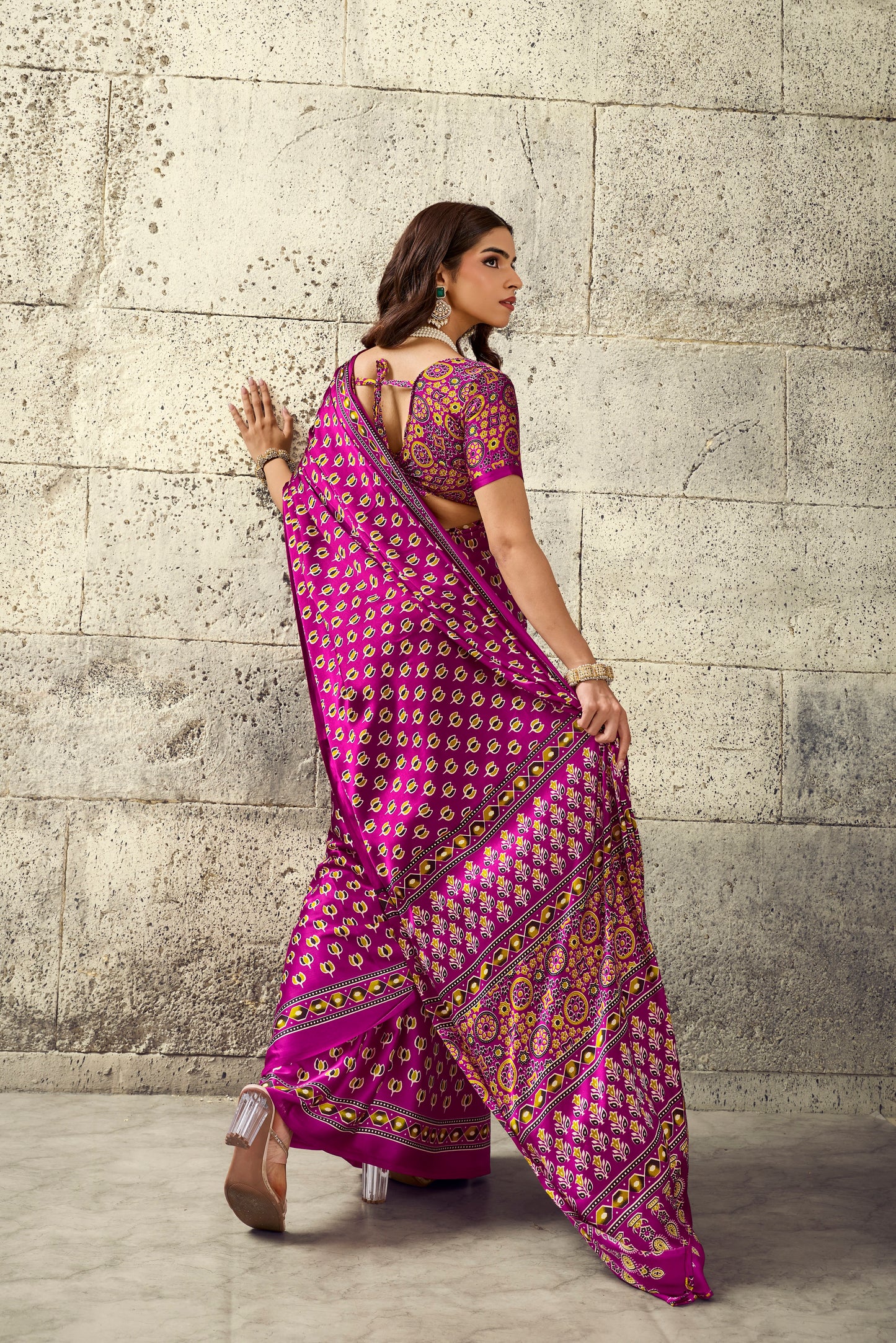 Magenta ready saree showing back drape, short sleeves, and contrasting patterned border