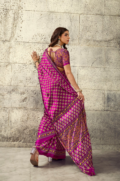 Magenta ready saree showing back drape, short sleeves, and contrasting patterned border