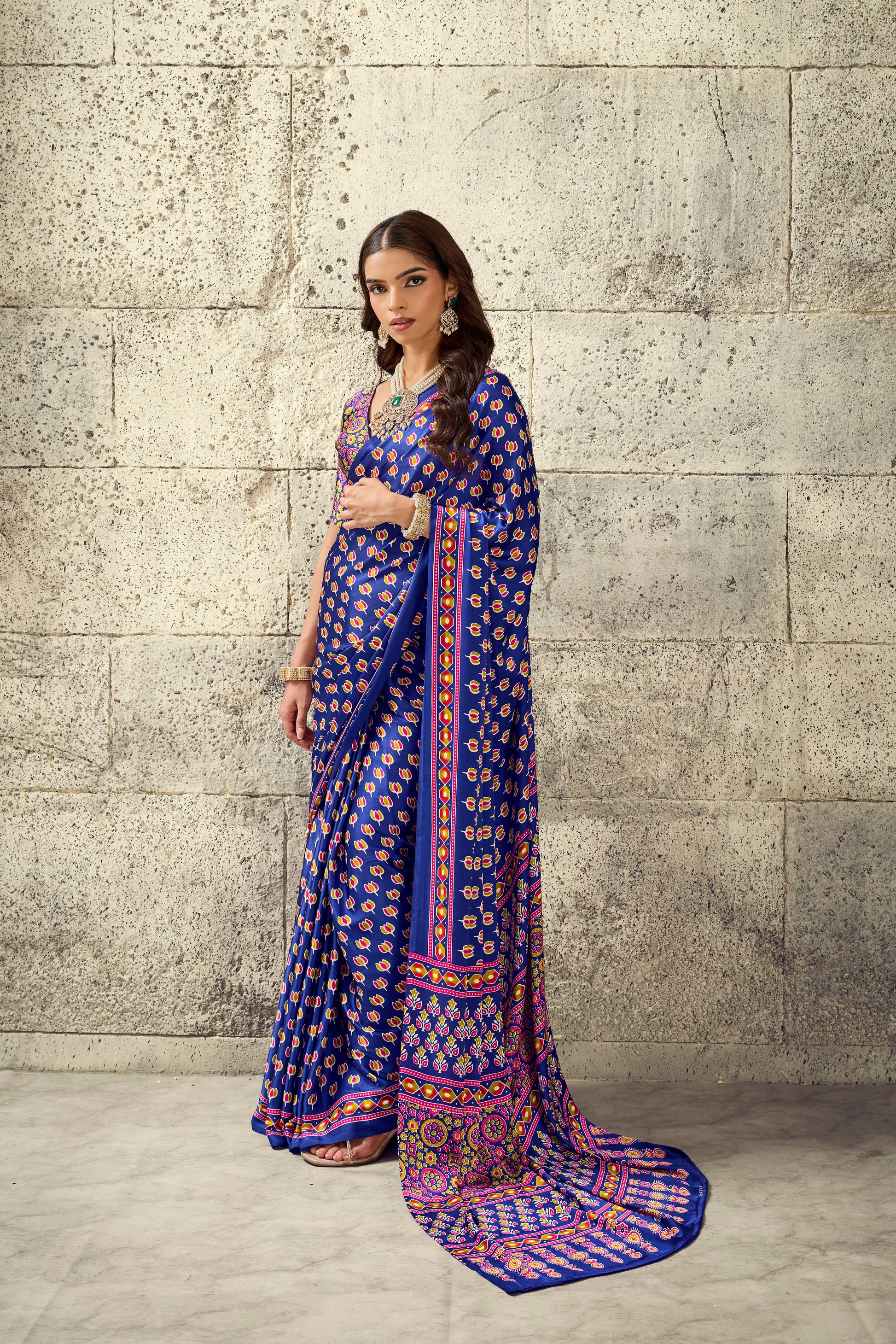 Cobalt blue saree with all-over small motif print, flowing pallu border