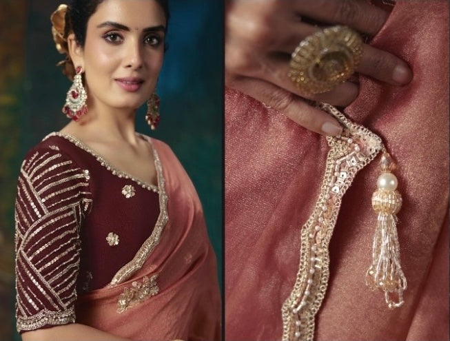 Dusty rose tissue silk saree with ornate border and pearl tassel detail