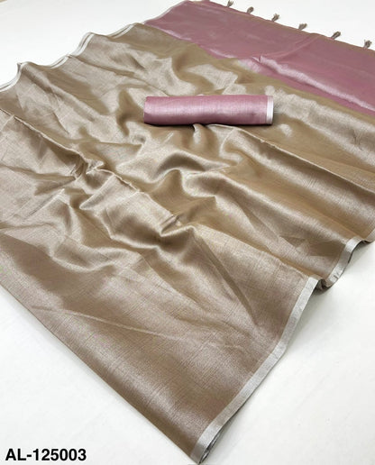 Bronze tissue silk saree fabric with pink border, flat lay with rolled end