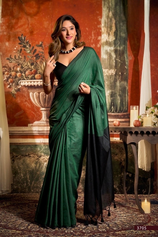 Green cotton easy saree with black contrast drape and off-shoulder neckline
