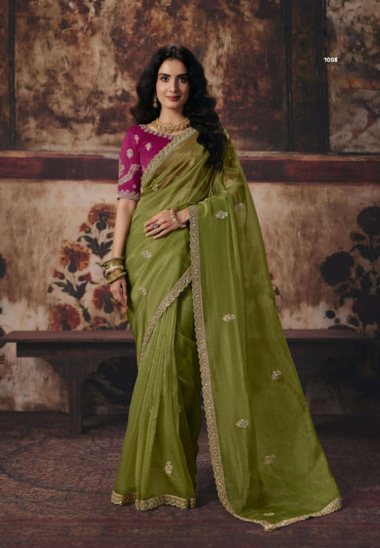 Green soft silk ready-to-wear saree with gold border and draped pallu, maroon blouse