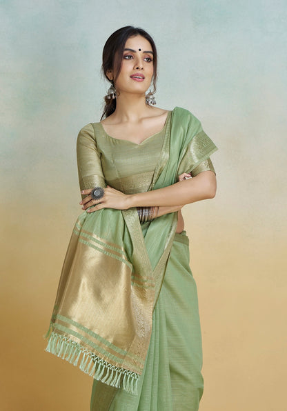Pista green khadi silk saree with gold border, short sleeves, draped pallu