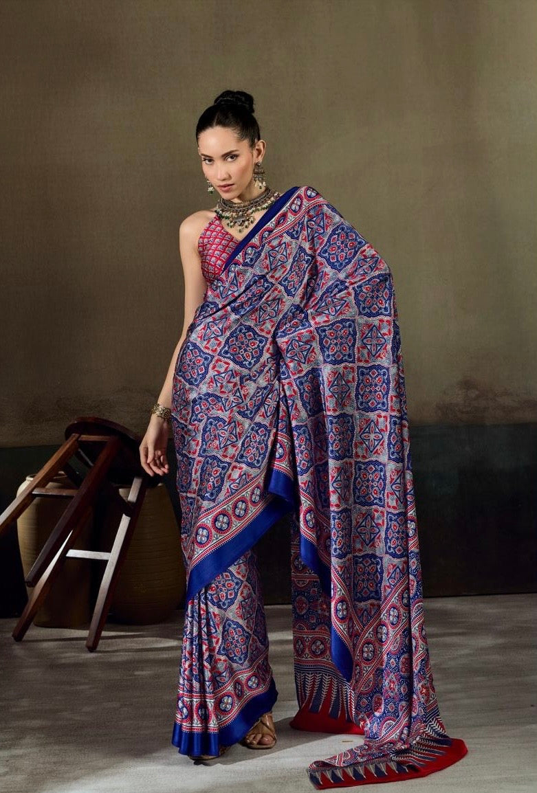Blue ready-to-wear saree with red geometric print, pallu drape and wide border