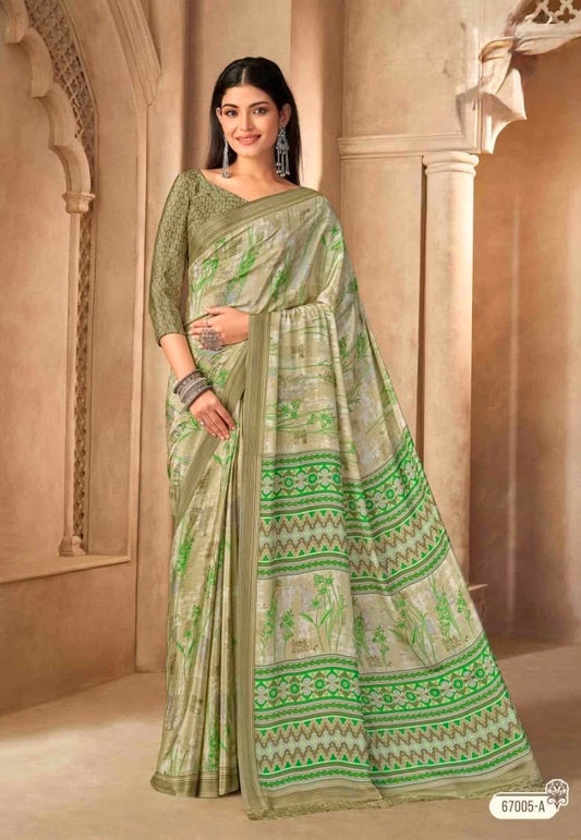 Sage green crepe silk saree with green printed border and pleated drape, ready-to-wear