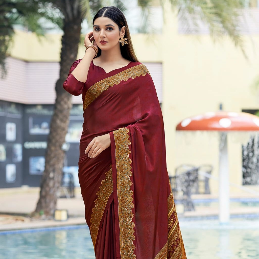 Maroon crepe silk easy saree with gold-trimmed neckline and shoulder border