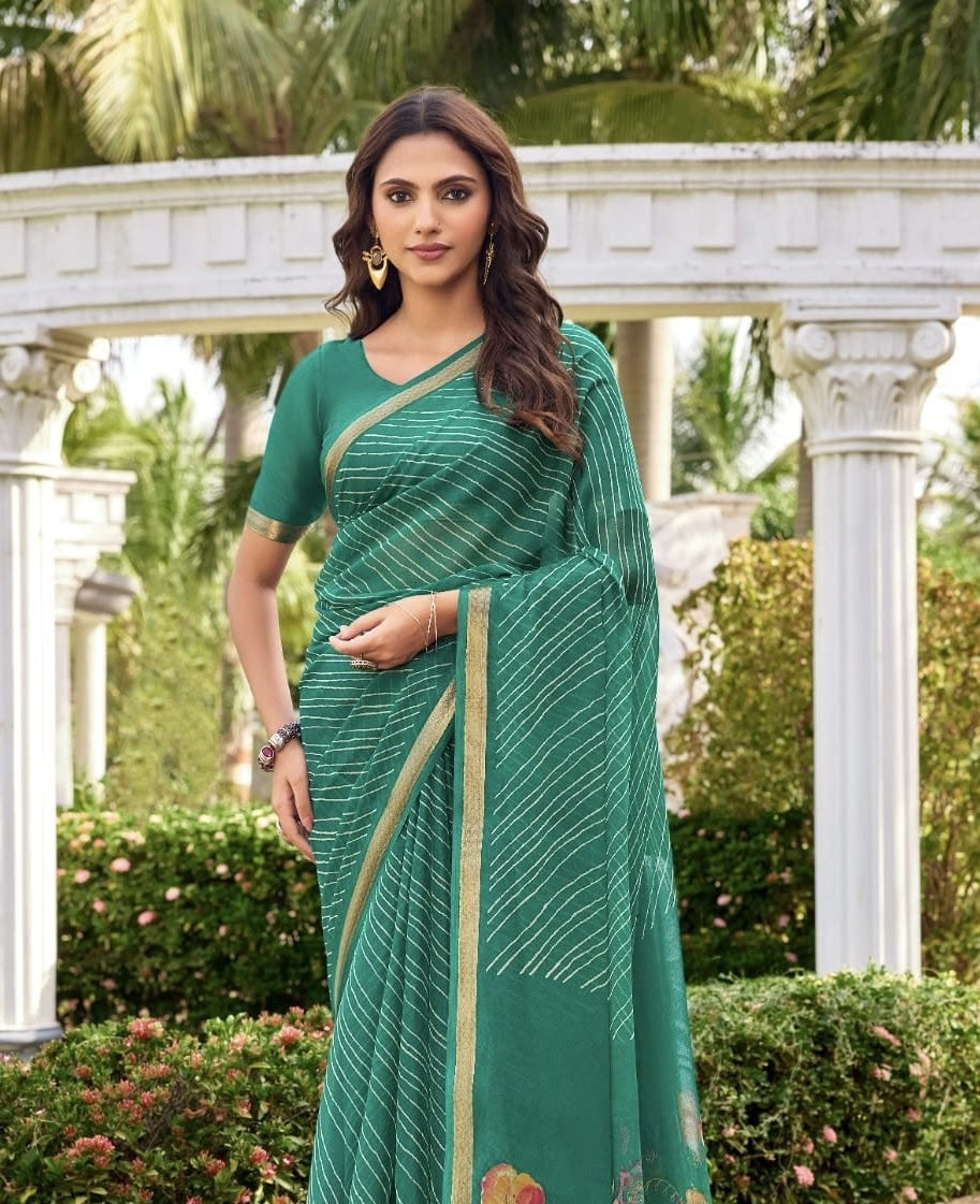 Sea green georgette saree, gold-trim border and floral pallu with matching blouse sleeves