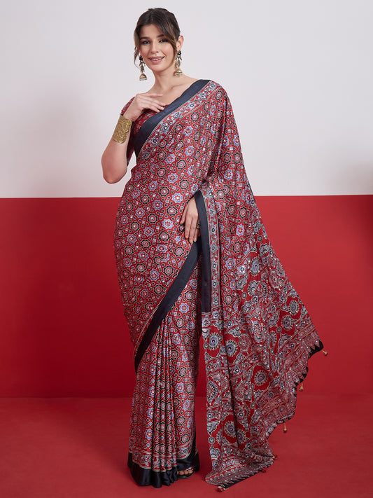 Red and navy printed mirror crepe saree with dark border, side slit, full drape