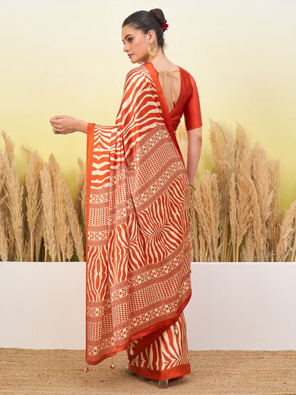 Orange striped crepe silk saree with gold border, open back short-sleeve blouse
