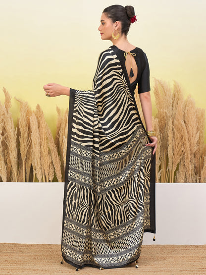 Black crepe silk easy saree with zebra stripes and patterned border, open-back blouse