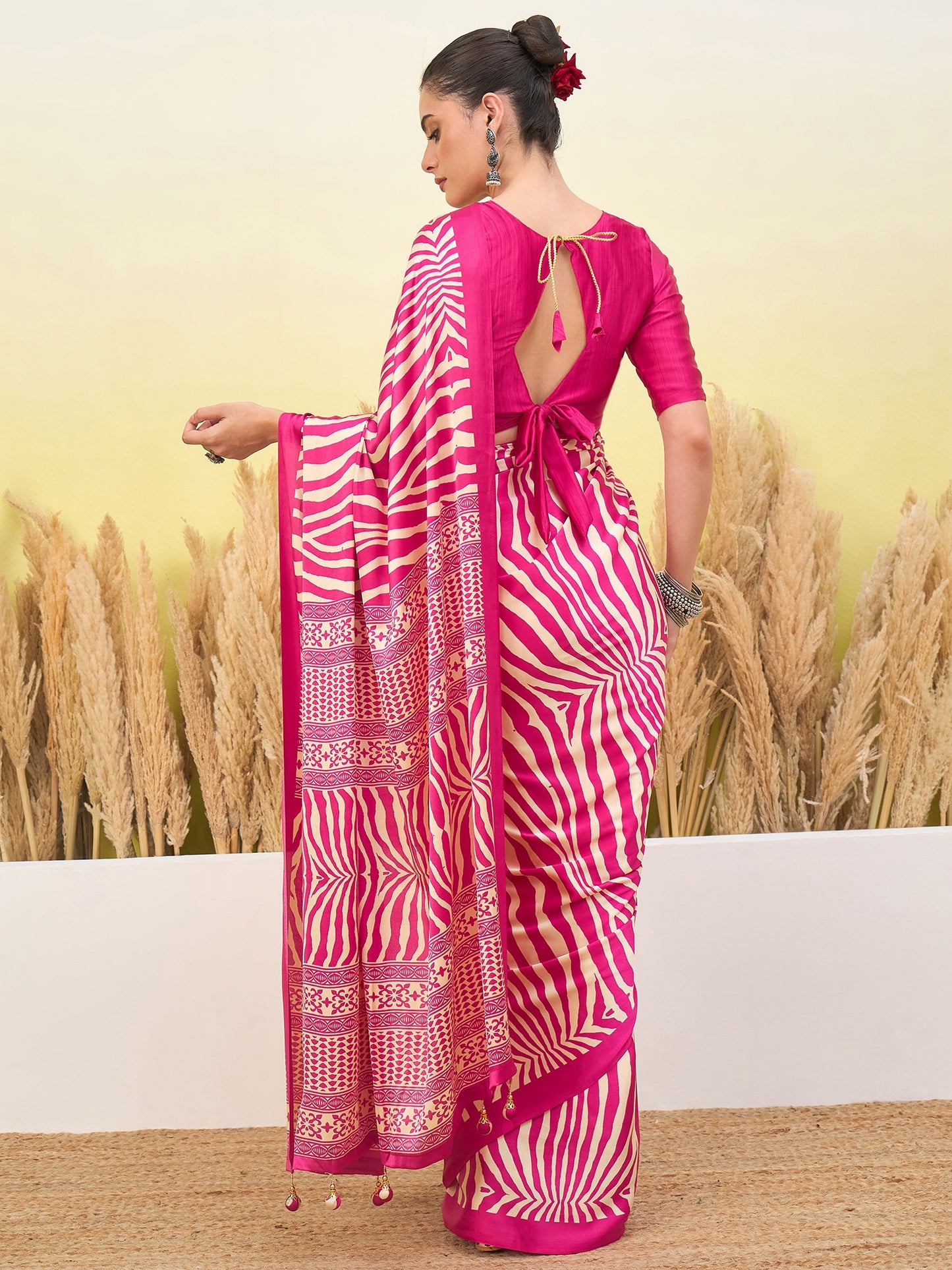 Pink crepe silk easy saree back tie with zebra-striped pallu and long border