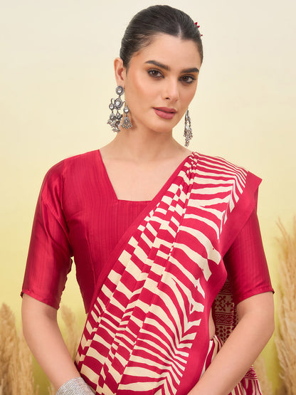 Red blouse with square neckline and white zigzag sari pallu, gold trim detail