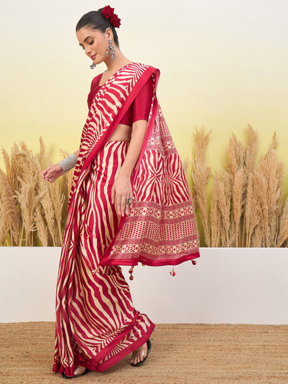 Red and white zigzag sari with gold border and tasseled hem, with 3/4 sleeve blouse