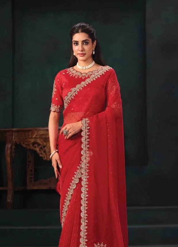 Cherry red saree drape and short-sleeve blouse with gold-tone embroidered trim
