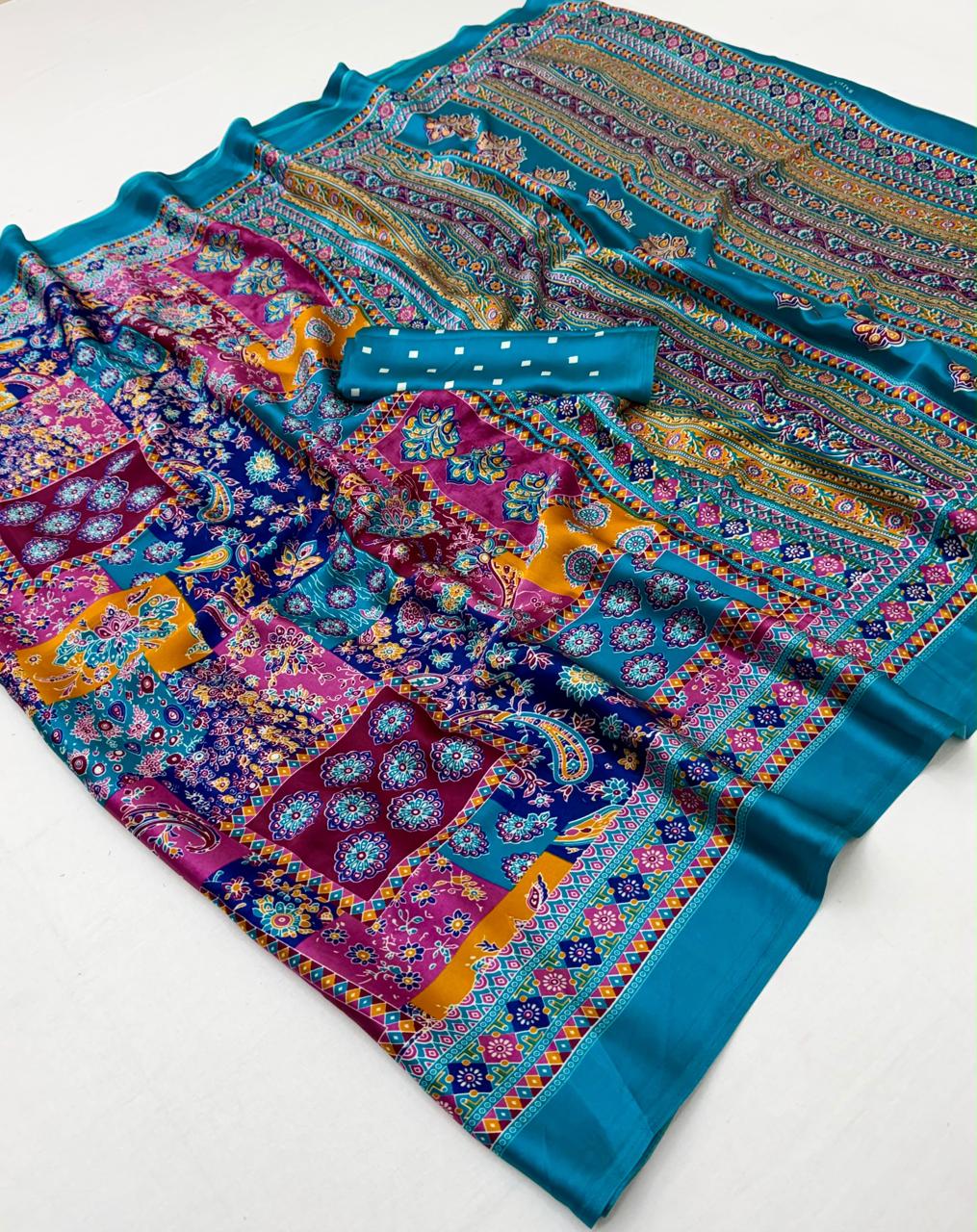 Blue modal silk ready-to-wear saree with multicolor geometric and floral print and teal border