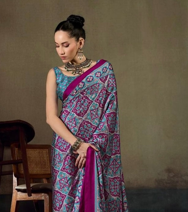 Magenta teal printed saree with pleated pallu and embroidered-style border