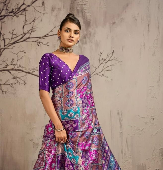 Model wearing a purple ready-to-wear saree with multicolor patchwork print and dotted blouse