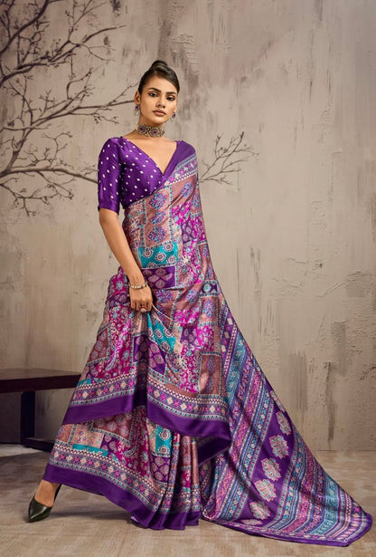 Full-length view of a purple patchwork saree with a long patterned drape and solid border