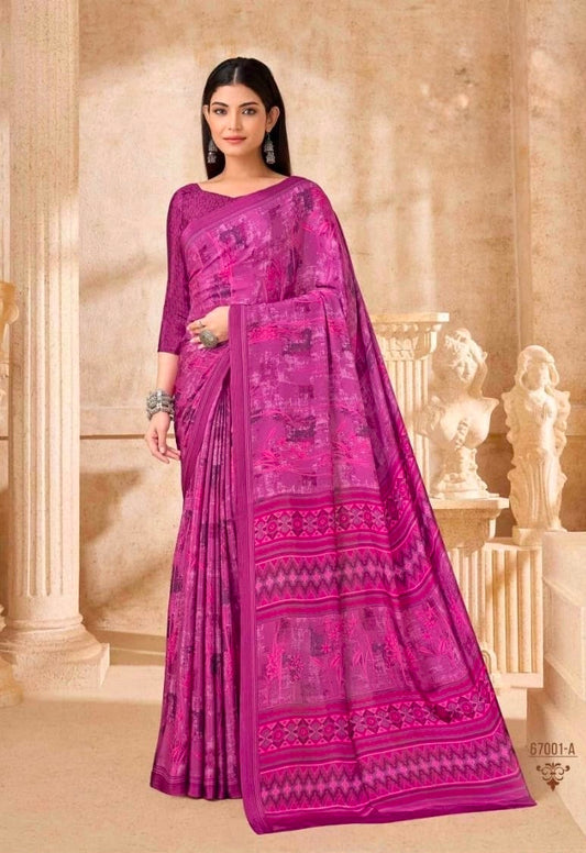Magenta crepe silk saree with geometric border and printed pallu drape, quarter-sleeve blouse