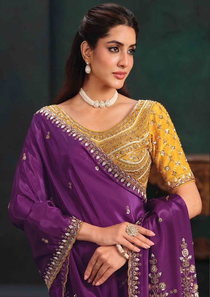 Purple saree with gold embellishments and detailed pre-stitched blouse neckline