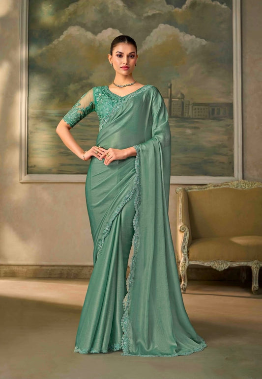 Sea green draped saree with V-neck and lace border, ready-to-wear cocktail dress