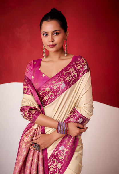 Ivory satin silk saree with magenta floral pallu detail and pink blouse sleeves