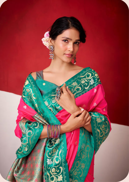 Teal and fuchsia satin silk saree with embroidered-style swirls and border