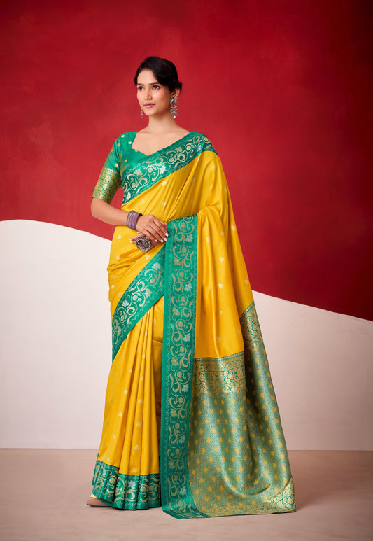Yellow satin silk easy saree with teal-green ornate border and drape, ready to wear