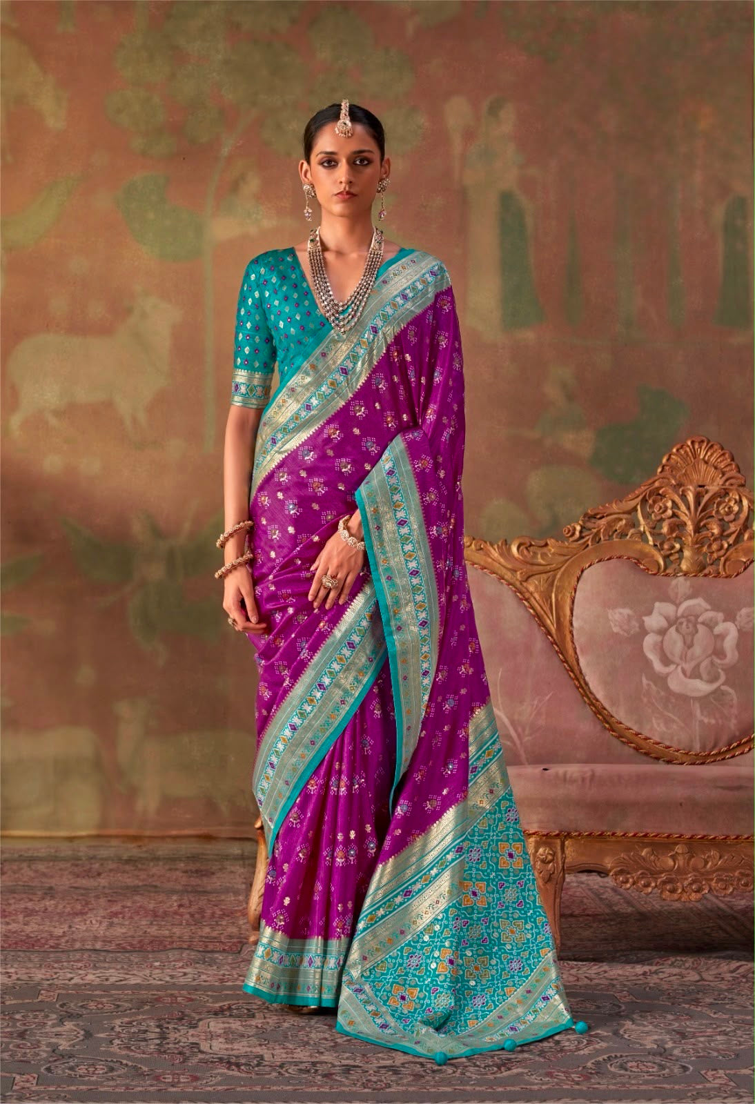 Purple silk easy saree with teal border, patterned pallu and pleated drape