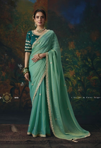 Sea green ready-to-wear silk saree with gold border and matching embroidered blouse