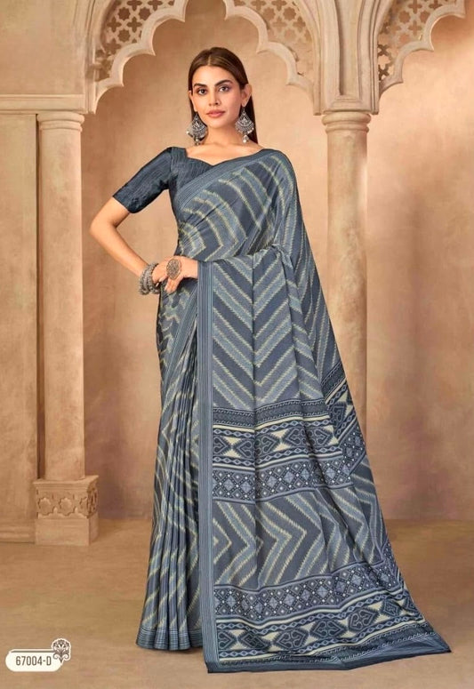 Slate grey crepe silk saree with striped chevron pattern and ornate border