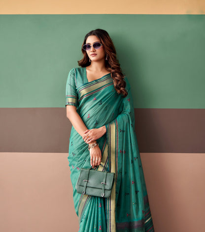 Teal green cotton ready-to-wear saree with small print motifs and striped border