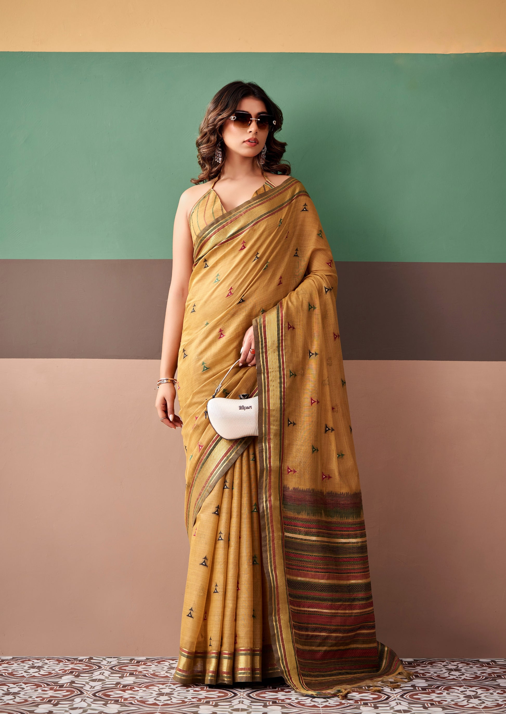 Mustard cotton easy saree with multicolor border and small printed motifs