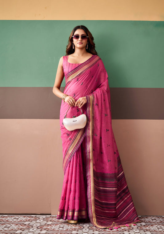 Pink saree with dark maroon striped border, draped with matching sleeveless blouse