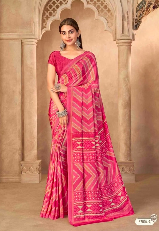 Deep pink crepe silk saree with matching short-sleeve blouse and geometric border