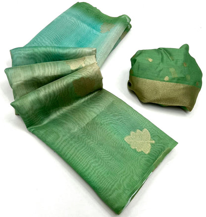 Green linen easy saree with gold star motif print, folded with matching pouch