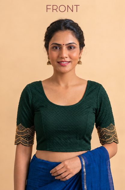 Bottle green stretch blouse with a scoop neck, short sleeves, and gold pipe-work sleeve trim