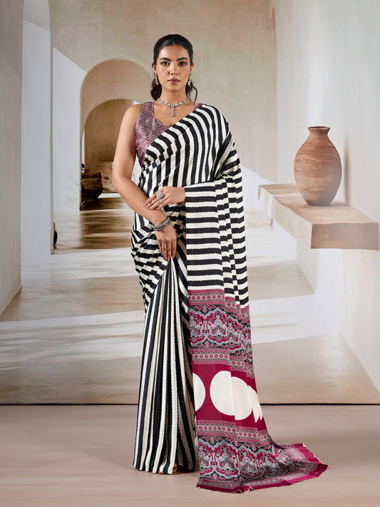 Striped crepe silk saree with magenta border and patterned pallu, draped