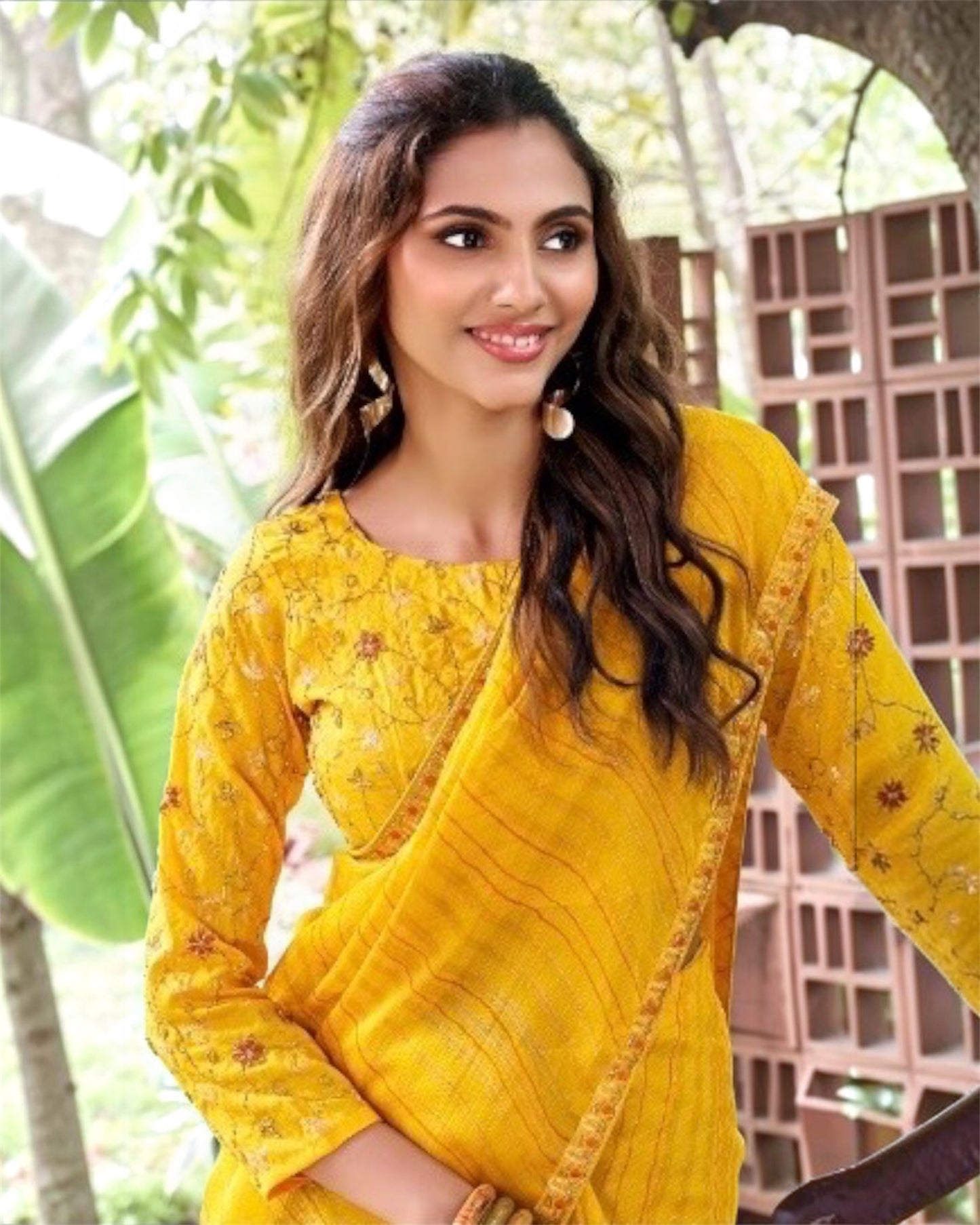 Yellow chiffon ready-to-wear saree with floral embroidery and long sleeves