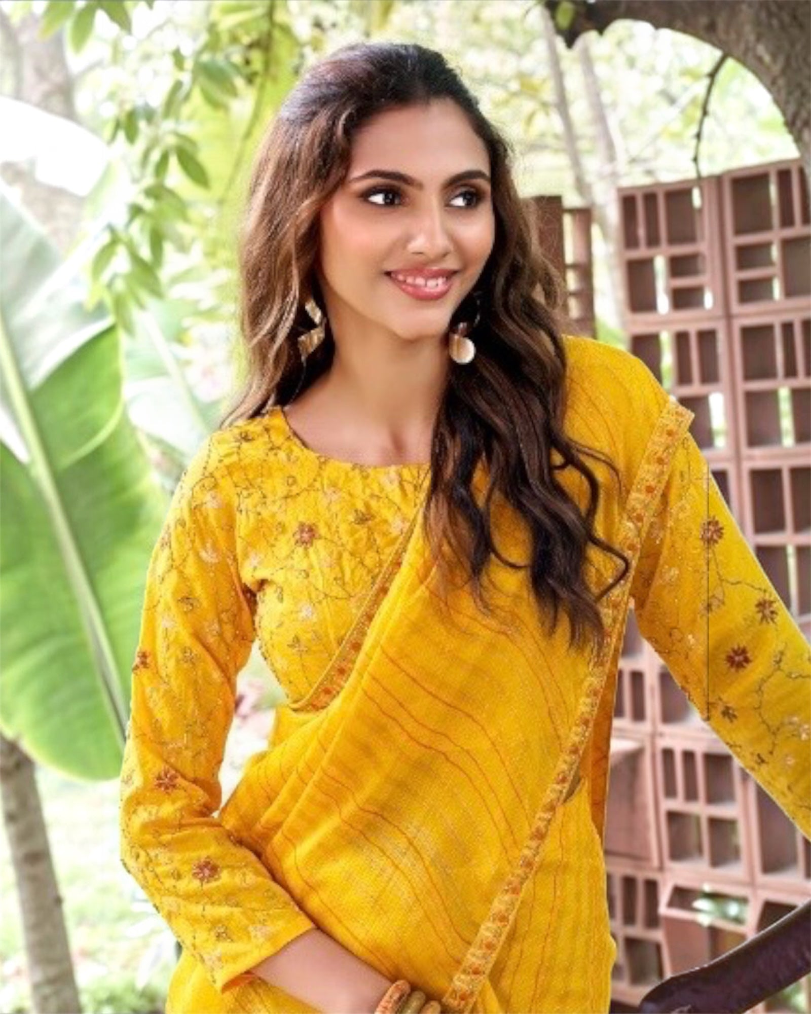 Yellow chiffon ready-to-wear saree with floral embroidery and long sleeves