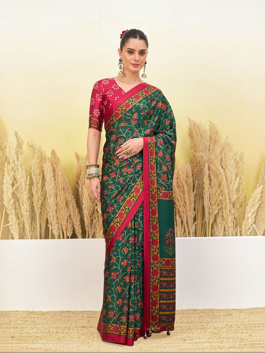 Green printed saree in traditional drape with maroon blouse and decorative border