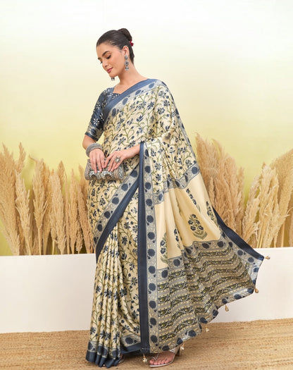Ivory and blue crepe silk easy saree in draped style with wide navy border