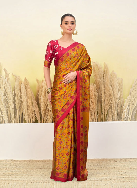 Mustard and pink crepe silk saree with floral print, draped style and short sleeves