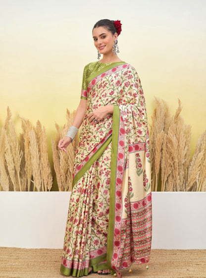 Ivory crepe silk saree with green border and red floral print, draped back view.