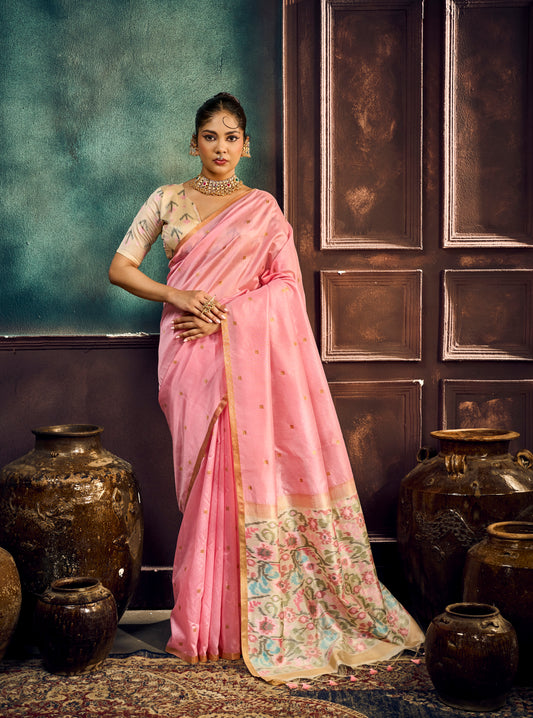 Pink saree with decorative blouse and multicolor floral border