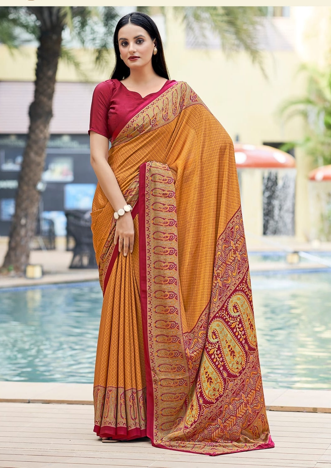 Mustard crepe silk easy saree with maroon blouse, patterned border and drape
