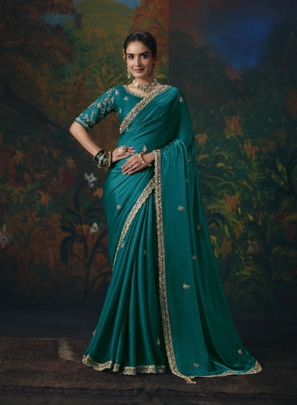 Turquoise tissue silk ready-to-wear saree with gold trim and matching embroidered blouse