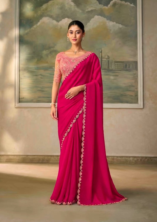 Fuchsia pink cocktail saree with embroidered blouse and scalloped border pallu